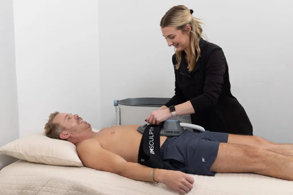 EmSculpt NEO® body contouring treatment in Youngsville LA at Serenity MedAesthetics targeting abdomen for muscle building and fat reduction